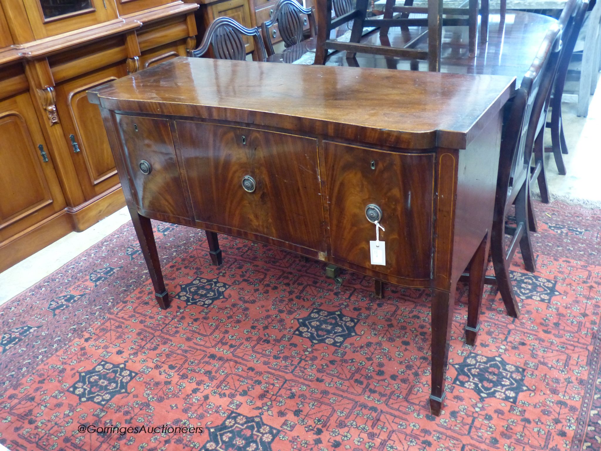 A George III mahogany sideboard of small proportions, length 117cm, depth 45cm, height 87cm